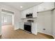 Stylish kitchen featuring modern appliances and white cabinetry at 1160 Chateau Ter, Mcdonough, GA 30253