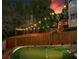 Backyard putting green with string lights for outdoor entertaining at 2015 Chelton Se Way, Smyrna, GA 30080