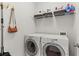 Functional laundry room equipped with modern washer and dryer at 2015 Chelton Se Way, Smyrna, GA 30080