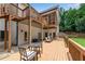 Spacious back deck with multiple seating areas, ideal for entertaining and enjoying the outdoors at 244 Cedar Ridge Way, Dallas, GA 30157