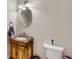 Powder room featuring an ornate vanity and decorative fixtures at 244 Cedar Ridge Way, Dallas, GA 30157