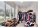 Walk-in closet with built-in shelving, lots of natural light and great view of the landscaping at 244 Cedar Ridge Way, Dallas, GA 30157