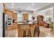 Kitchen featuring custom wood cabinets, granite countertops, and stainless steel appliances at 244 Cedar Ridge Way, Dallas, GA 30157