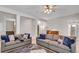 Spacious living room with hardwood floors, neutral colors and plenty of natural light at 244 Cedar Ridge Way, Dallas, GA 30157