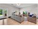 Spacious living room with french doors, hardwood floors, neutral paint and plenty of natural light at 244 Cedar Ridge Way, Dallas, GA 30157