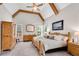 Bright, spacious bedroom with vaulted ceilings and wooden beams at 244 Cedar Ridge Way, Dallas, GA 30157