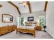 Bedroom with vaulted ceilings and wooden beams at 244 Cedar Ridge Way, Dallas, GA 30157