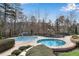 Community pool with splash pad and playground in wooded surroundings at 244 Cedar Ridge Way, Dallas, GA 30157
