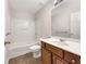 Cozy bathroom with a bath/shower combination, and a wood vanity at 3110 Cambrian Ter, Austell, GA 30106