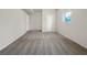 A neutral-colored bedroom includes a window and closet for a simple, clean design at 3110 Cambrian Ter, Austell, GA 30106