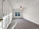 Light filled bedroom offers cozy carpet, ceiling fan, and a sun-drenched window at 3110 Cambrian Ter, Austell, GA 30106