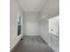 Large walk-in closet featuring carpet, a window and a wire shelving system at 3110 Cambrian Ter, Austell, GA 30106