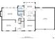 Detailed first floor plan showcasing layout of living spaces, kitchen, and garage at 1550 Pine Creek Way, Woodstock, GA 30188