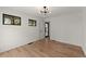 Bright bedroom with hardwood floors, neutral walls, and modern lighting at 2870 Ridgemore Nw Rd, Atlanta, GA 30318