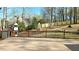 Expansive back deck with views of the large fenced backyard and mature trees surrounding the property at 1960 Calvin Dr, Duluth, GA 30097