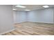 Spacious finished basement area with recessed lighting, and LVP flooring at 1960 Calvin Dr, Duluth, GA 30097