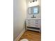 Cozy bathroom vanity featuring marble countertop, undermount sink and black fixtures at 1960 Calvin Dr, Duluth, GA 30097