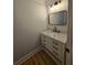 Modern bathroom features white marble vanity and classic fixtures at 1960 Calvin Dr, Duluth, GA 30097
