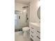 Shower room with white vanity and drawers, black showerhead and glass shower door at 1960 Calvin Dr, Duluth, GA 30097