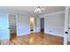 Bedroom features hardwood floors, walk in closet and attached bathroom at 1960 Calvin Dr, Duluth, GA 30097