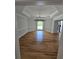 Spacious dining room showcases hardwood floors, crown molding, and natural light at 1960 Calvin Dr, Duluth, GA 30097