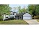 Charming two-story home with landscaped yard and stone accents, perfect curb appeal at 1960 Calvin Dr, Duluth, GA 30097
