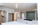 Bright kitchen with white cabinets, quartz countertops, and stainless steel appliances at 1960 Calvin Dr, Duluth, GA 30097