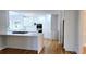 Bright kitchen with white cabinetry, a center island, and stainless steel appliances at 1960 Calvin Dr, Duluth, GA 30097