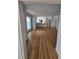 Open-concept living space features beautiful hardwood floors and neutral paint at 1960 Calvin Dr, Duluth, GA 30097