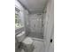 Walk-in shower boasts rainfall showerhead, shower wand, and storage niche at 1960 Calvin Dr, Duluth, GA 30097
