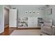 room with built-in bookshelf and a relaxing chair at 7130 Spalding Ne Ct, Atlanta, GA 30328