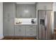 Stylish kitchen featuring modern appliances, sleek cabinets, and ample counter space at 7130 Spalding Ne Ct, Atlanta, GA 30328