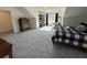 Spacious bedroom offering ample natural light and comfortable living space at 1702 Bonica Xing # 1702, Cumming, GA 30040