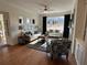 Spacious living room featuring hardwood floors, comfortable seating, and bright, natural light at 1702 Bonica Xing # 1702, Cumming, GA 30040