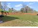 Large, grassy backyard enclosed by a wooden fence at 1903 River Birch Ln, Atlanta, GA 30316