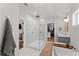 Stunning bathroom features a glass enclosed shower, separate soaking tub, and access to a spacious walk in closet at 1903 River Birch Ln, Atlanta, GA 30316