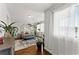 Bright bedroom with bed, plants, hardwood flooring, sheer curtains and plenty of natural light at 1903 River Birch Ln, Atlanta, GA 30316