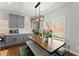 Bright dining area featuring modern cabinets and a large window with natural light at 1903 River Birch Ln, Atlanta, GA 30316