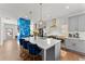 Modern kitchen featuring an island with barstool seating and stylish pendant lighting at 1903 River Birch Ln, Atlanta, GA 30316