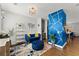 Stylish living room with hardwood floors, unique lighting, and a cozy blue velvet seating area at 1903 River Birch Ln, Atlanta, GA 30316