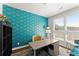 Home office featuring colorful wallpaper, a comfortable desk, and ample natural light from the window at 1903 River Birch Ln, Atlanta, GA 30316