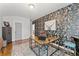 Well-appointed office with hardwood floors, patterned wallpaper, and an eclectic mix of decor at 1903 River Birch Ln, Atlanta, GA 30316
