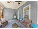 Cozy screened-in porch featuring comfortable seating and tranquil ambiance at 1903 River Birch Ln, Atlanta, GA 30316