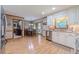 Bright kitchen with stainless steel appliances and adjacent dining area, creating a welcoming space at 4481 Lucerne Sw Pl, Lilburn, GA 30047