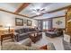 Comfortable living room featuring a fireplace, coffered ceiling, and stylish decor at 4481 Lucerne Sw Pl, Lilburn, GA 30047