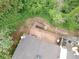 Backyard featuring a large wooden deck, steps to the yard, mature trees, and landscaping at 3987 Bayside Cir, Atlanta, GA 30340
