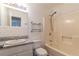 Bathroom featuring a tub-shower combination, a toilet, and a vanity with gray countertops at 3987 Bayside Cir, Atlanta, GA 30340
