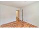 Well-lit bedroom with door to the bathroom and closet, and wood laminate floors at 3987 Bayside Cir, Atlanta, GA 30340