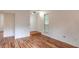 Open foyer area showcasing hardwood floors and natural light from a nearby window at 3987 Bayside Cir, Atlanta, GA 30340