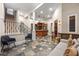 Finished basement with a cozy seating area, wet bar, and access to stairs at 4620 Chattahoochee Se Xing, Marietta, GA 30067